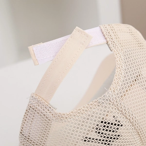 Detail of adjustable Velcro strap and breathable mesh fabric on kids baseball cap