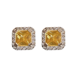Detail of square yellow zircon halo earrings with silver setting for men and women