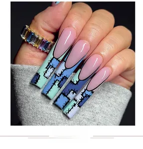 Detail of long French ballet press-on nails with blue-cyan patchwork and comic thorn art