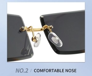 Détail macro des plaquettes de nez confortables et du pont en métal doré sur lunettes