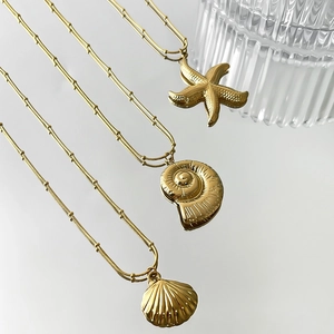 Golden titanium steel necklaces with starfish and shell pendants in marine style