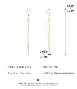 Detail view of long tassel butterfly wing earrings with precise size and weight specs