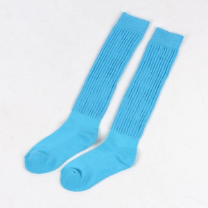 Close-up of bright blue ribbed knit slouch socks in a warm thick cotton texture