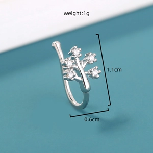 Macro view of silver star ear stud with dimensions of 1.1cm by 0.6cm and 1g weight