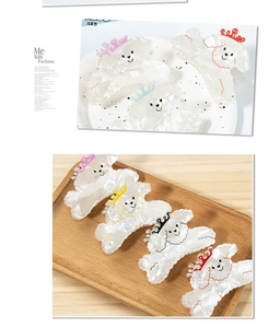 Detailed view of cute dog hair claws with colorful crown accents on a stylish background