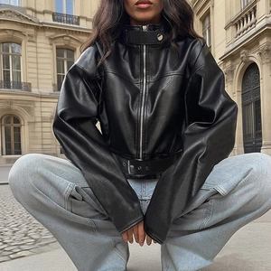 Women's black faux leather jacket with stand collar and waist belt in street style
