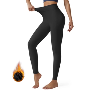 Detail showing high-elasticity waist and thick thermal fleece lining on black leggings
