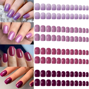 Detail view of 96pcs matte false nails in gradient purple, pink, dark red and wine red sets