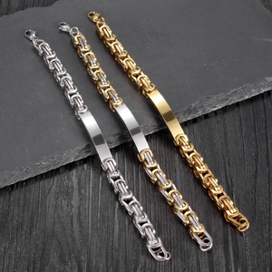 Three men's Byzantine king chain bracelets in silver, gold, and bicolor on stone