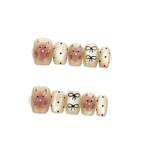 Handmade cat eye press-on nails featuring cute hand-painted kittens and black bows
