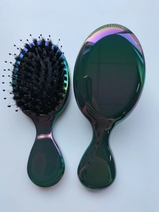 Front and back view of dark green laser finish hairbrush with boar bristles