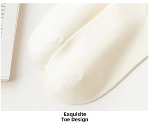 Detailed macro view of the smooth toe seam and fine knit texture of the beige cotton sock