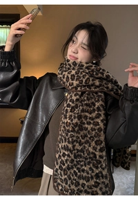 Close-up of leopard print faux wool scarf showing thick plush texture and retro style