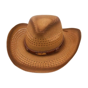 Macro detail of brown woven straw cowboy hat featuring golden feather and leather band