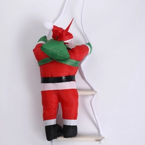 Christmas Santa Claus climbing a rope ladder ornament for festive holiday home decoration