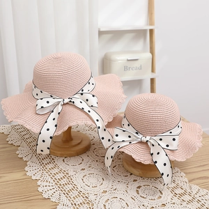 Pink parent-child straw hat set with wave edges and black and white polka dot bows