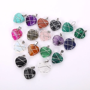 Variety of 18 wire-wrapped heart crystal pendants in various semi-precious gemstones