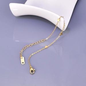 Minimalist gold titanium steel bracelet with three heart charms and lobster clasp