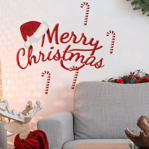 Festive Merry Christmas wall decal with Santa hat and candy cane in a cozy living room