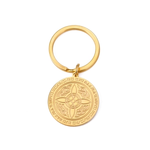 Gold stainless steel keychain with circular Celtic knot and rune pattern on white background