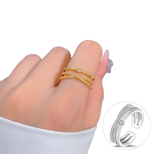 Crossed layered gold and silver open rings with micro-set zircons for women