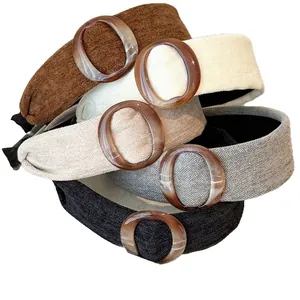 Five assorted velvet acrylic hairbands with amber marble buckles for high crown styling