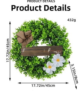 Detail of 45cm eucalyptus wreath with home sweet home sign and daisy accents