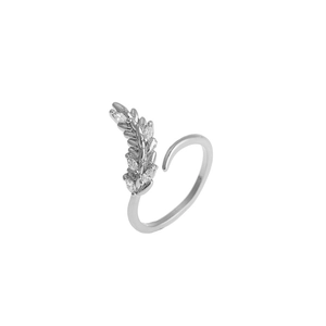 Detailed view of silver olive leaf open ring featuring micro-pave cubic zirconia stones