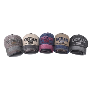 Washed cotton baseball caps with OCEAN embroidery in five retro vintage colors