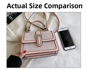 Pink lady handbag with white jacquard flap and silver buckle shown with a smartphone