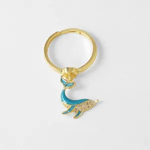 18k gold plated adjustable ring featuring blue enamel whale charm and sparkling rhinestones