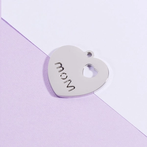 Polished stainless steel heart-shaped pendant with MOM engraving and cutout design