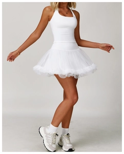 White sports mini dress with tight racerback top and tiered mesh tutu skirt detail