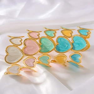 Colorful heart enamel hair claw set with gold-plated metal finish and marble texture