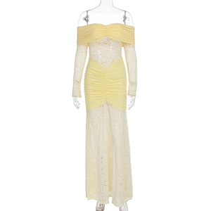 Detail view of the lace embroidery and ruched design on this off-shoulder long sleeve dress