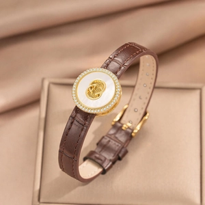 Brown crocodile texture leather bracelet with clover charm and white mother of pearl inlay