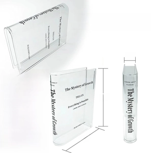 Clear acrylic book vase with multi-angle views showing dimensions and growth typography