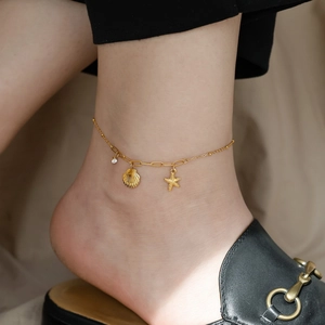 Starfish and shell gold titanium steel anklet for women featuring sparkling rhinestones