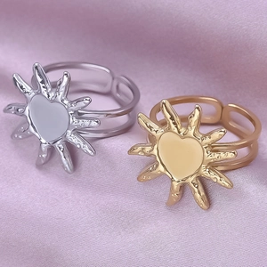 Irregular sun heart open ring in 18K gold and silver plating on satin background
