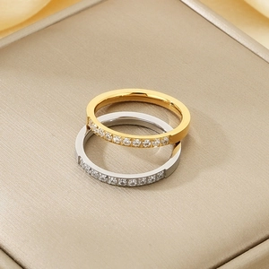 Minimalist stainless steel eternity rings in gold and silver with half-set cubic zirconia