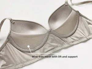 Detail of push-up padding and mesh lining inside a wireless ice silk bra in beige