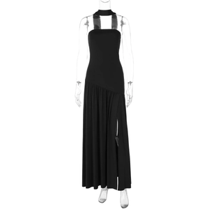 Detail view of black halter neck dress with side pleats and high slit hemline