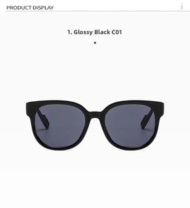 Detailed front view of bright black cat-eye sunglasses with dark grey lenses on white background