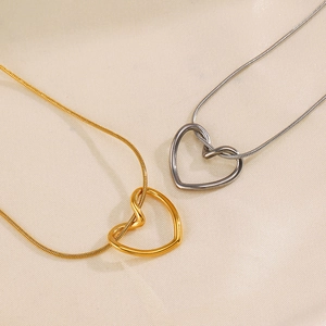 Minimalist hollow heart necklace in 18K gold and silver plated titanium steel