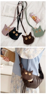 Detailed view of cat-shaped PU leather coin purses in multiple pastel colors with straps