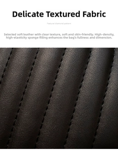 Macro detail of soft black quilted leather material with high density foam padding