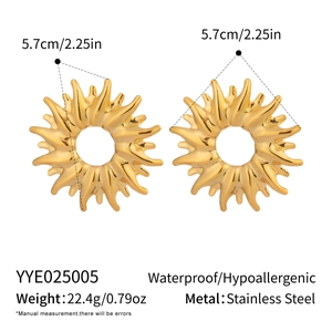 Macro view of gold sun flower earrings with 5.7cm size details and technical specs