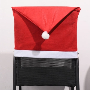 Detail of red and white Christmas hat chair cover on a mesh chair back for party decor