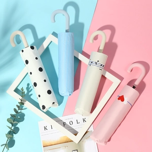 Portable folding sun umbrellas with hook handles in heart and stripe patterns