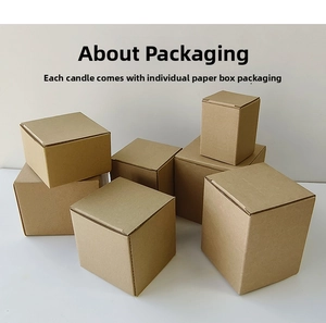 Brown kraft paper boxes in various sizes for candle gift packaging on studio background